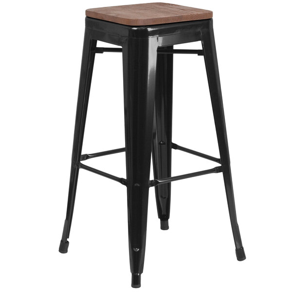 A Flash Furniture black metal bar stool with a square wood seat.