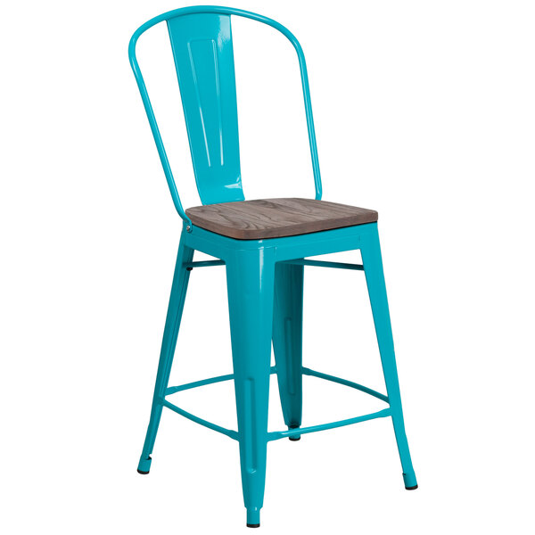 A turquoise metal restaurant bar stool with a wooden seat.