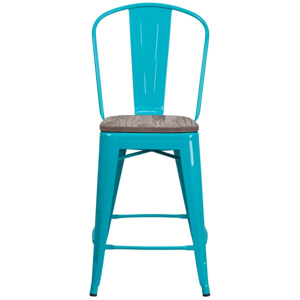 A teal-blue metal restaurant bar stool with a wood seat.