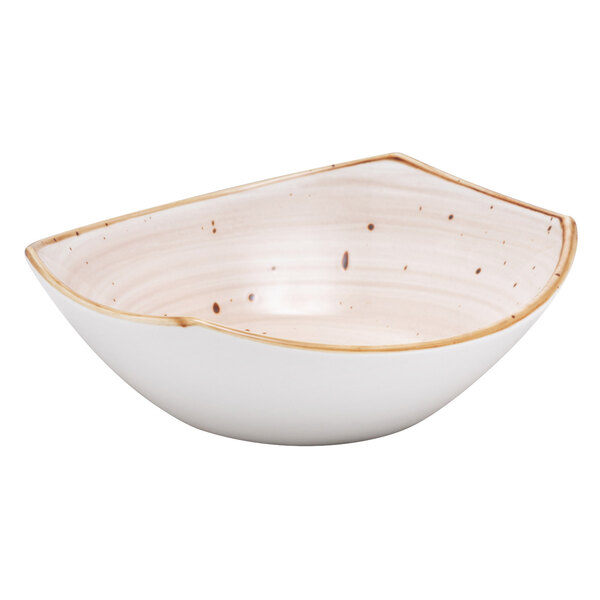A white bowl with brown specks on it.