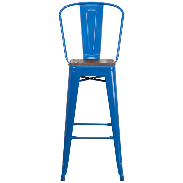 A blue metal bar stool with a wooden seat.