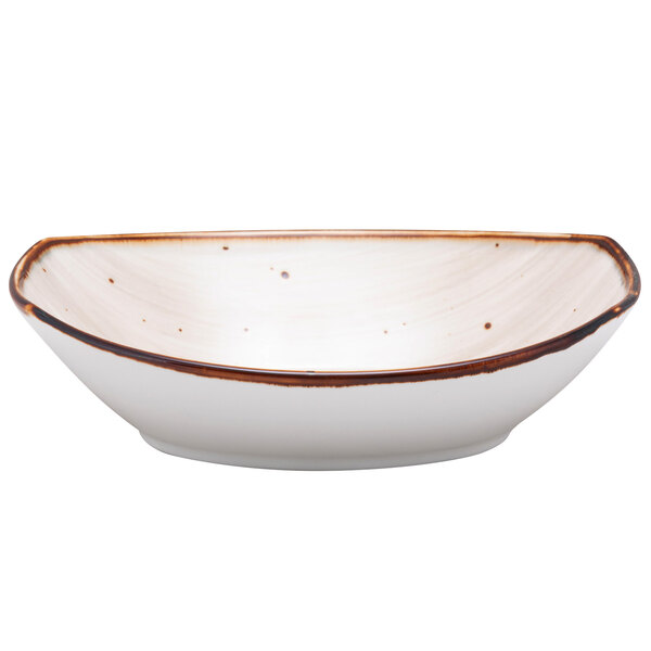 A white china deep bowl with a brown Pueblo rim.