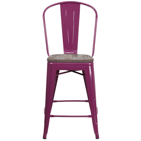 A purple metal restaurant bar stool with a wooden seat.