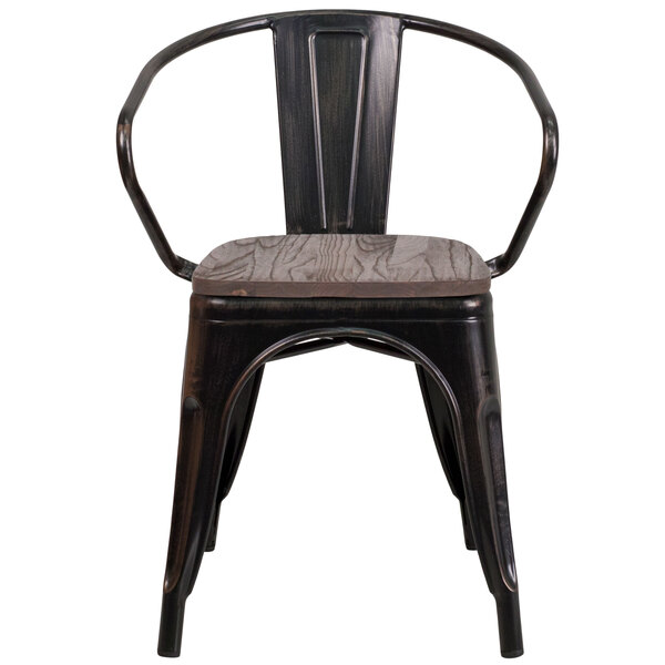 A black metal chair with a wooden seat.
