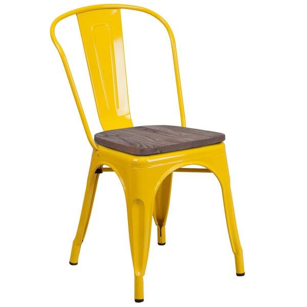 A yellow metal Flash Furniture restaurant chair with a wooden seat.