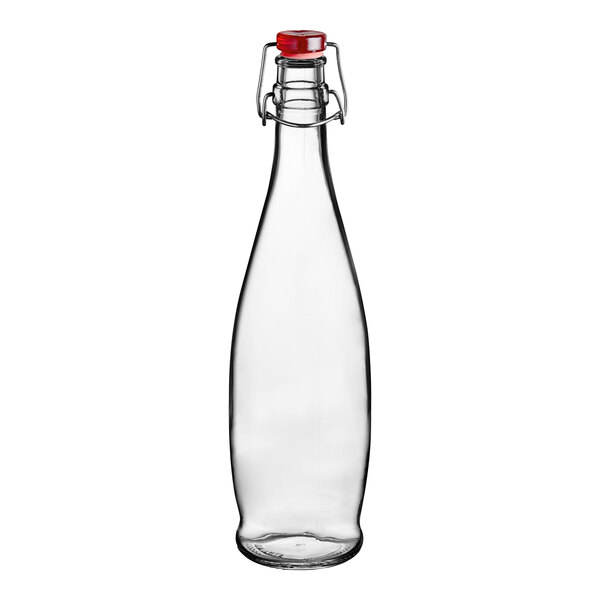 A clear glass bottle with a red wire bail lid.