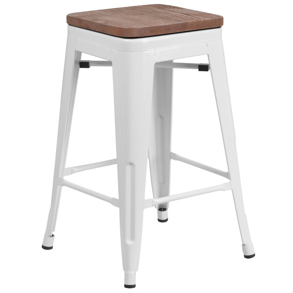 A white metal Flash Furniture counter height stool with a wood seat.