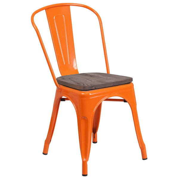 An orange metal restaurant chair with a wooden seat.