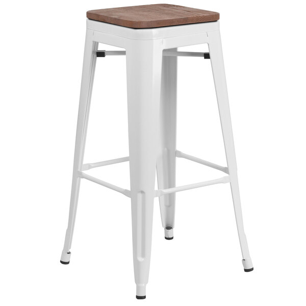 a white stool with a seat