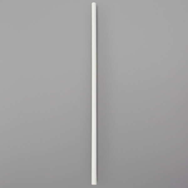 A white paper chocolate rose or fruit stick.