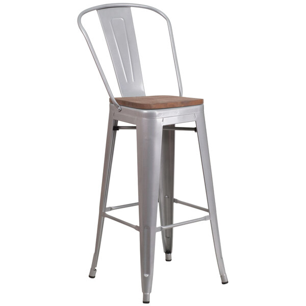 A Flash Furniture silver metal bar stool with a wood seat and vertical slat back.