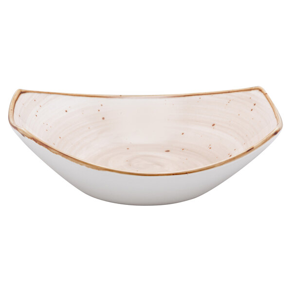 A white bowl with brown specks on it.