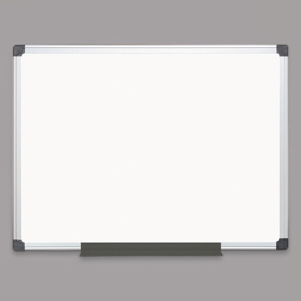 A MasterVision white board with a black frame.