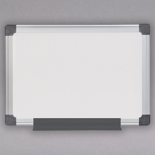 A white board with a black frame.