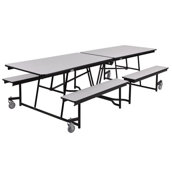 A National Public Seating rectangular cafeteria table with benches on a chrome frame.
