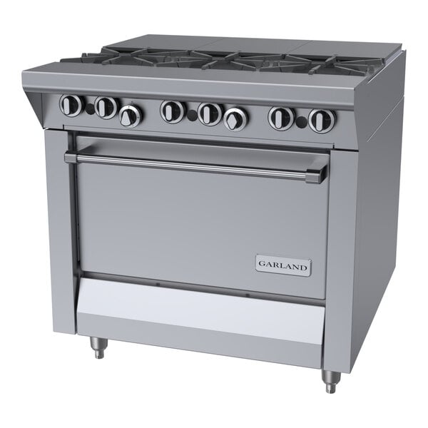 A commercial stainless steel natural gas range with three burners, a French top, and a standard oven.