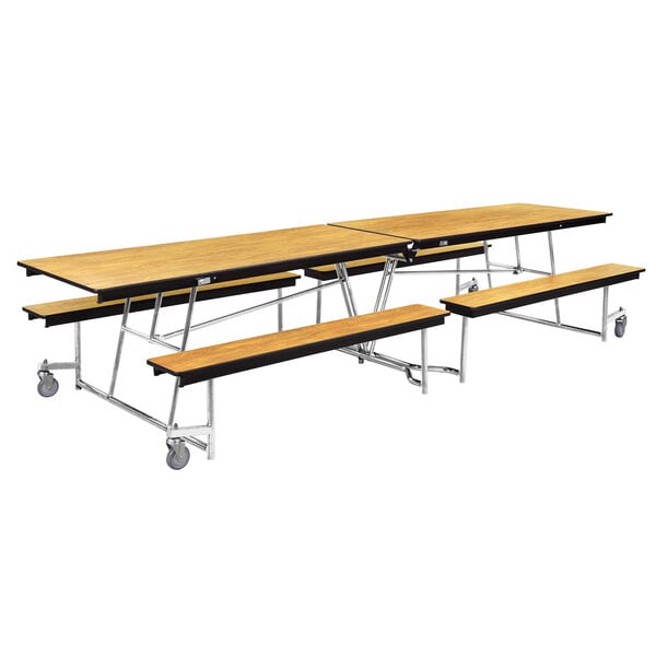 A National Public Seating rectangular cafeteria table with attached benches on wheels.