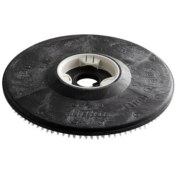 A black Minuteman pad driver with a white center.