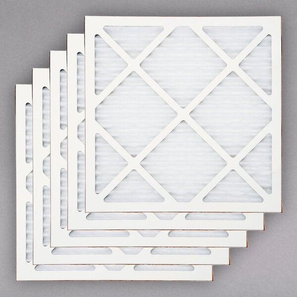 A stack of white square B-Air pleated media filters.