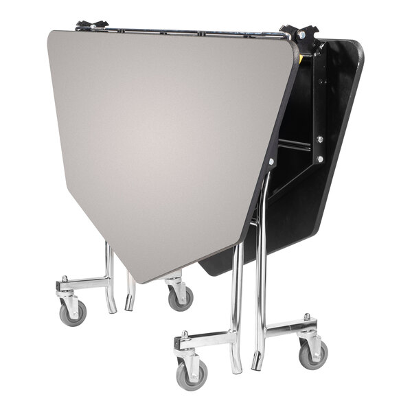 A National Public Seating octagonal MDF cafeteria table with a chrome frame and wheels.