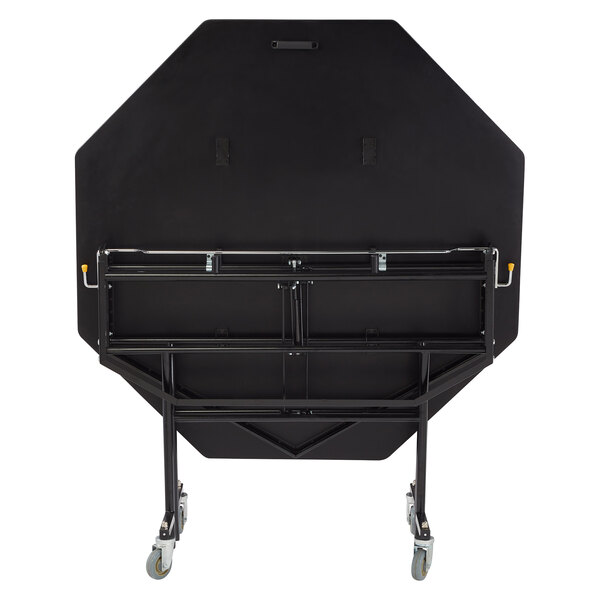 A black table with wheels.