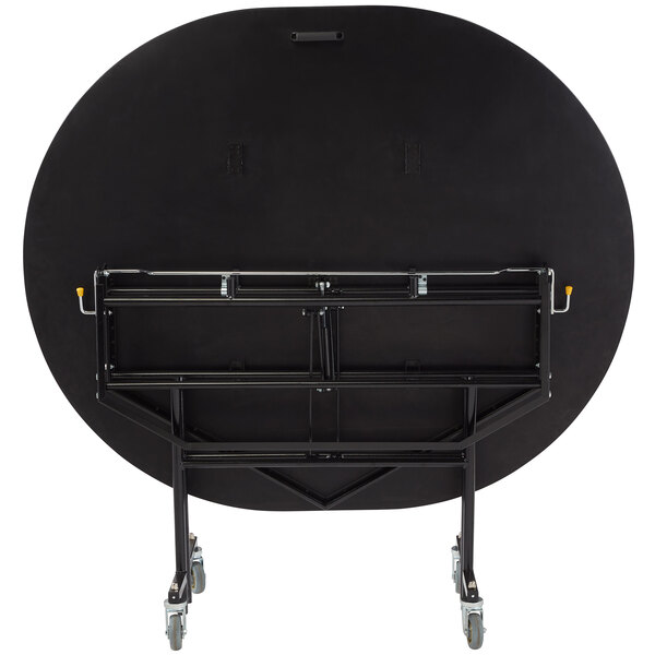 A black oval cafeteria table with wheels.