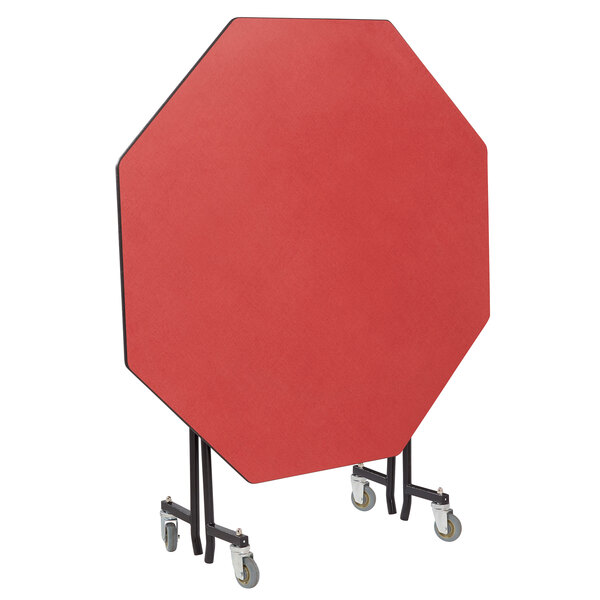 A red octagonal National Public Seating cafeteria table with a T-Mold edge and chrome frame.