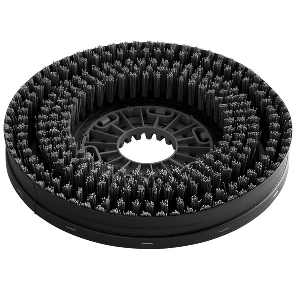 A gray circular brush with a white circular center and bristles.