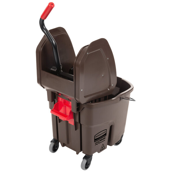 a brown mop bucket with a handle