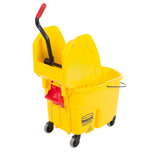 A yellow Rubbermaid mop bucket with a handle.