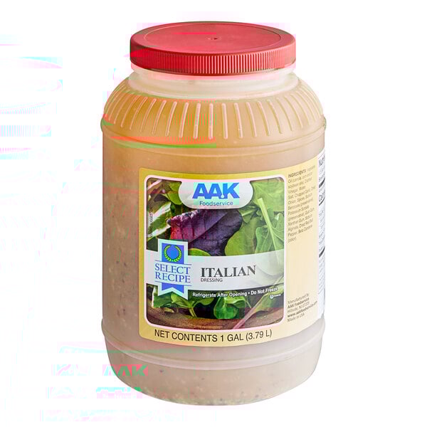 A plastic container of AAK Select Recipe Traditional Italian Dressing with a red label.