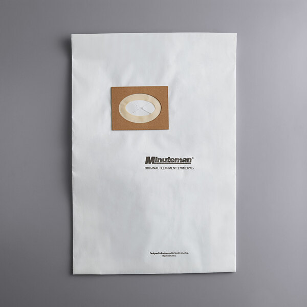 A white envelope with a brown circle on it.