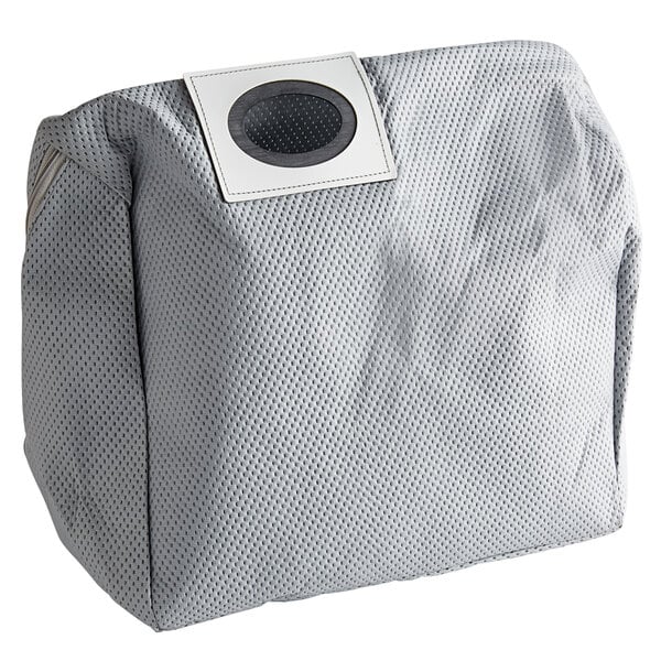 A grey Minuteman cloth bag with a hole in the top.