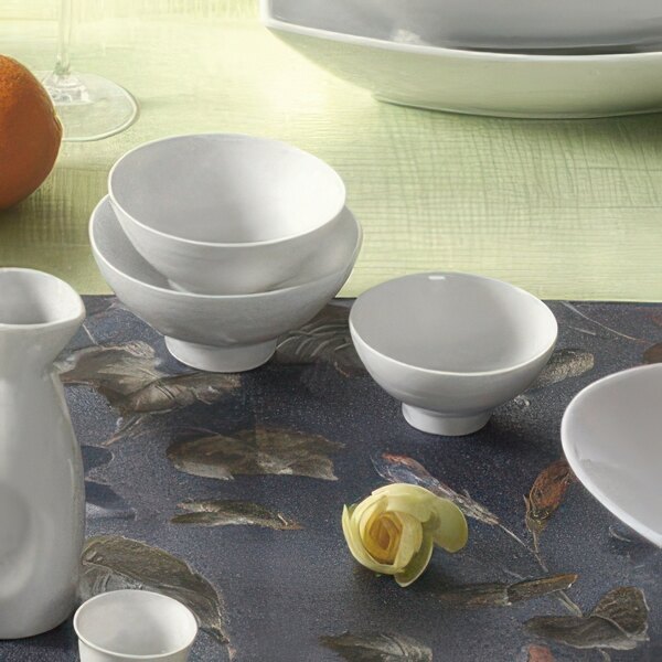 A stack of CAC Super White Sushia rice bowls.