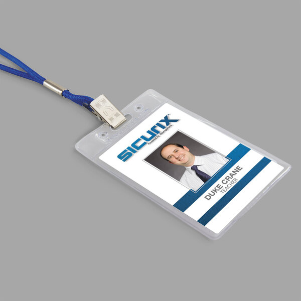 A clear vertical badge holder holding a business card with a metal clip.