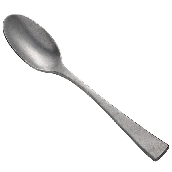 A close-up of the Oneida Lexia stainless steel oval bowl spoon with a metal handle.