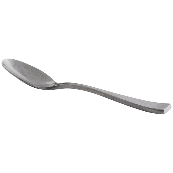 A Oneida Lexia stainless steel spoon with an oval bowl and metal handle.