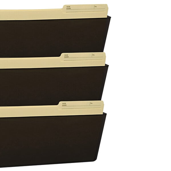 A Storex wall file with three smoke-colored pockets.