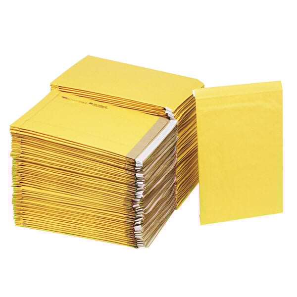 A stack of yellow Jiffy padded mailers.