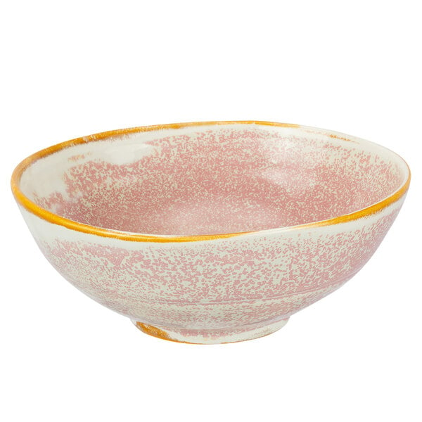 A white porcelain bowl with a speckled rim.