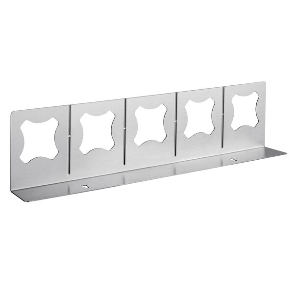 A metal shelf with five holes for holding tongs.