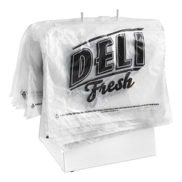 A stand holding a stack of clear plastic deli bags printed with 'Deli Fresh' in large letters.