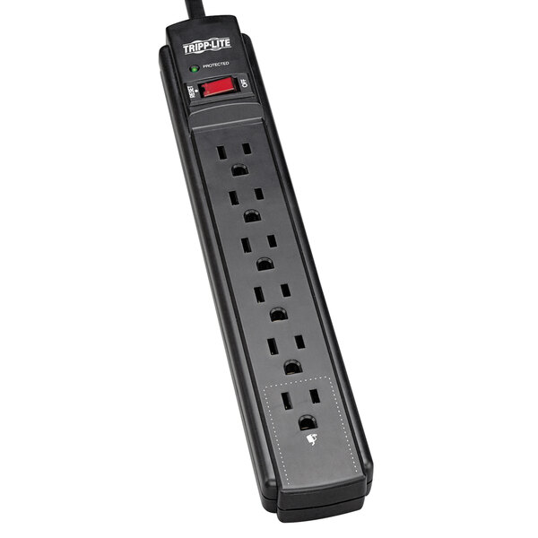 A black Tripp Lite surge suppressor power strip with 6 outlets and a green light.