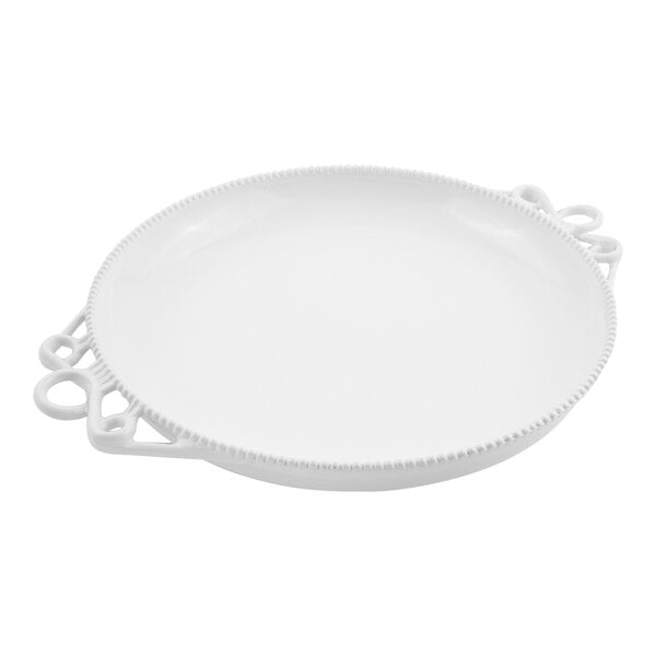 A round white platter with a beaded rim and decorative looped handles on each side.