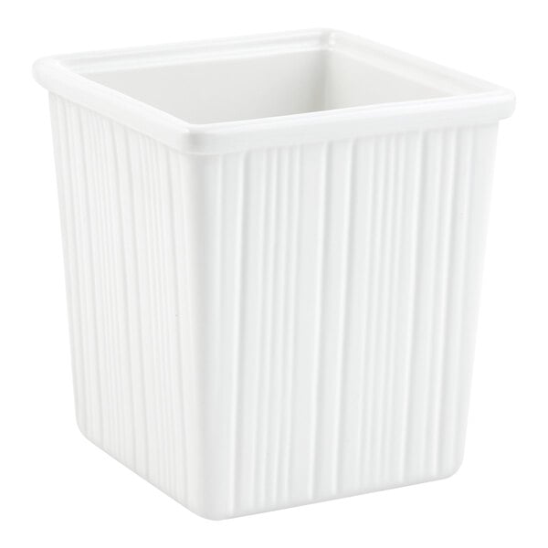 A white, square-shaped bowl with straight sides and a vertical lined texture on the exterior.
