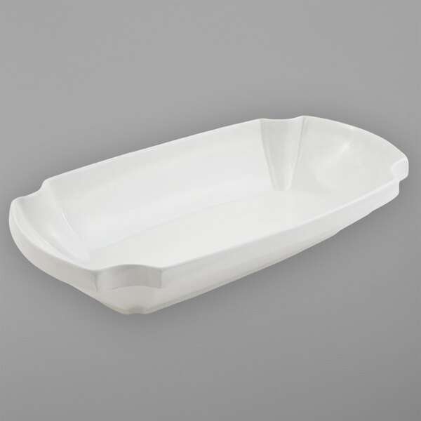 A white rectangular Bon Chef casserole dish with a handle.