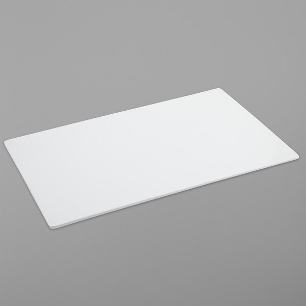 A white rectangular Bon Chef tile on a gray surface.