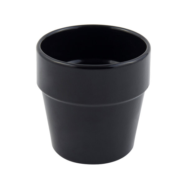 A black Bon Chef cast aluminum salad dressing pot.