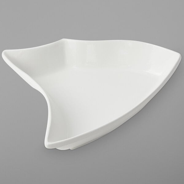 a white plate with a curved edge