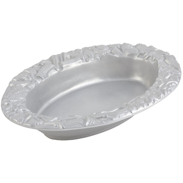 A silver oval Bon Chef pasta bowl with a floral design.